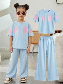 SHEIN Bộ đồ thể thao thường ngày cho mẹ và con gái, gồm áo thun tay rớt và quần dài, thích hợp cho mùa hè, thích hợp cho đi bộ/thể thao/đi học và mặc thường ngày, tuyệt vời cho mặc thường nhật và đi học vào mùa xuân và mùa thu, thích hợp cho mẹ và con gái, chị em gái và tôi. - Màu xanh lam - Xem 4
