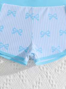 SHEIN 女童坦克背心套装，无袖露脐上衣饰有蝴蝶结印花，纯色短裤饰有蝴蝶结，适合夏季度假、海滩、游泳池、节日派对和休闲穿着。 - 淺藍色 - 查看 6