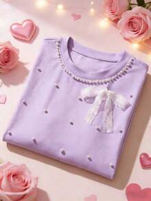 SHEIN Franclia 女士粉色蝴蝶结珍珠装饰甜美Y2K短袖T恤，适合约会、日常、通勤，百搭时尚休闲。淡紫色上衣，淡紫色女式上衣，粉彩色系服装，薰衣草色上衣，浅紫色上衣，串珠上衣，女士上衣和衬衫，串珠衬衫，女士服装，可爱上衣，少女风上衣，定制上衣，漂亮上衣，可爱服装。 - 淡紫色 - 查看 4