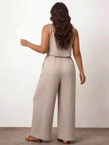 Enliva Bộ đồ liền thân màu trơn họa tiết du lịch cỡ lớn - Màu be - Xem 2