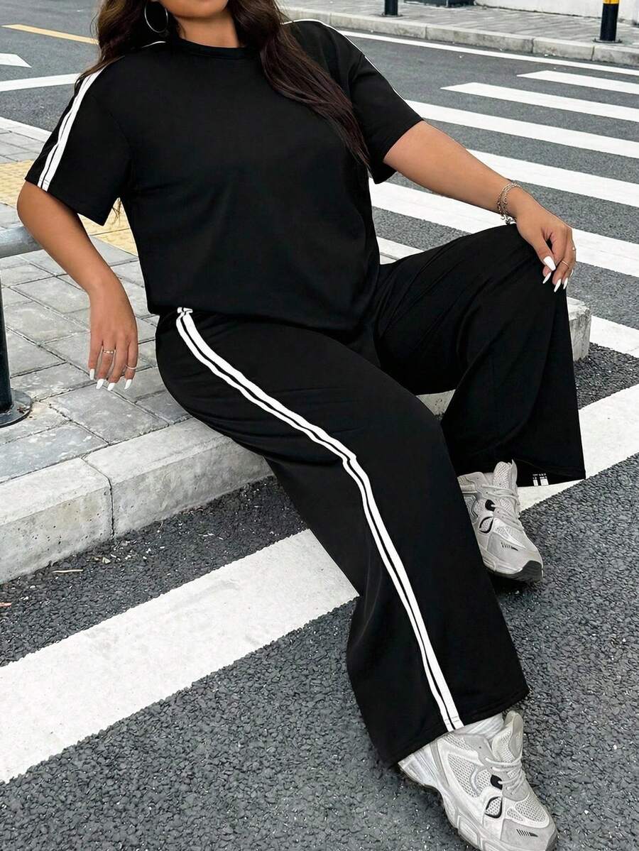 Muchica Conjunto de camiseta de manga corta con rayas de contraste en los laterales y pantalones holgados de pierna ancha de estilo deportivo casual para mujer talla grande