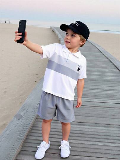 Young Boy Black Dinosaur Print Short Sleeve Polo Shirt With Dark Grey Shorts, Soft And Skin-Friendly Fabric, Suitable For School, Outing Or Home Wear