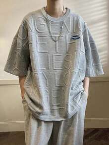 Claim Dot Camiseta holgada de hombre con parche con letra y hombros caídos - Gris - Ver 1