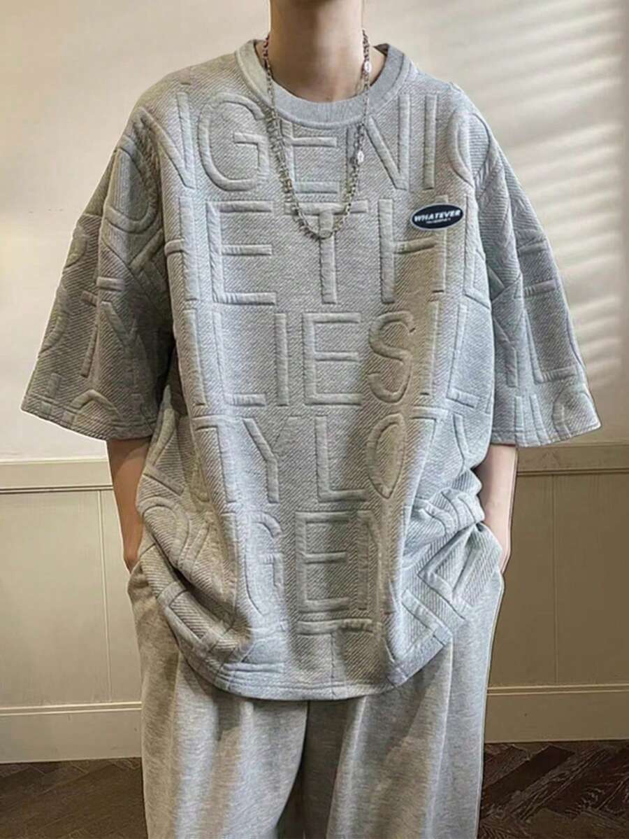 Claim Dot Camiseta holgada de hombre con parche con letra y hombros caídos - Gris - Ver 1