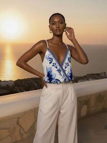 CAJUNI Ärmellose Bodysuit mit Arabesque Blumen Muster - Blau-Weiß - Übersicht 7