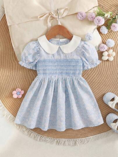 SHEIN Baby Girls' Spring Casual Vacation Cute Sweet Puff Sleeve A-Line Short Sleeve Dress, Textured Fabric With Exquisite Smocking Craft, High Quality And Cost-Effective, Suitable For Travel Or Vacation Outfits