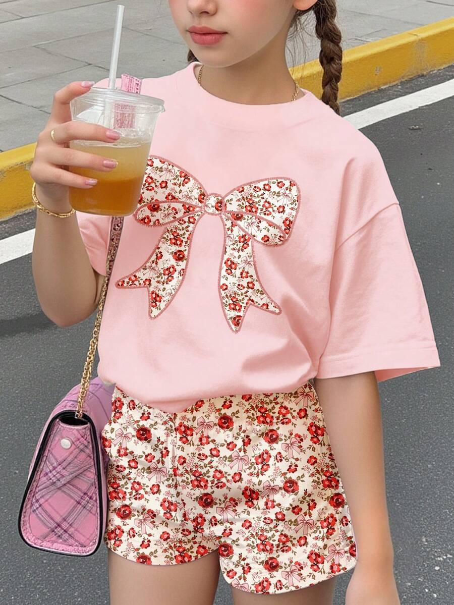 Bộ 2 món cho bé gái tuổi teen, gồm áo thun ngắn tay cổ tròn thắt nơ và quần short họa tiết hoa nhí, thích hợp mặc hàng ngày vào mùa hè, đi chơi, nghỉ mát, du lịch, thư giãn mùa hè. - Nhiều màu - Xem 1