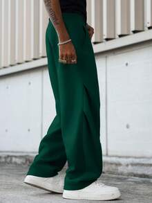 Manfinity Hypemode Pantalones de chándal casuales para hombres de unicolor con cordón en la cintura y bolsillos en diagonal - Verde - Ver 2