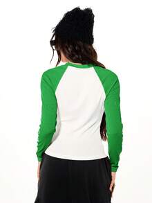 SUMWON WOMEN Raglan Sleeve Graphic Crew Neck Long Sleeve Top With Cross Print And Side Text Detail - Green - View 2