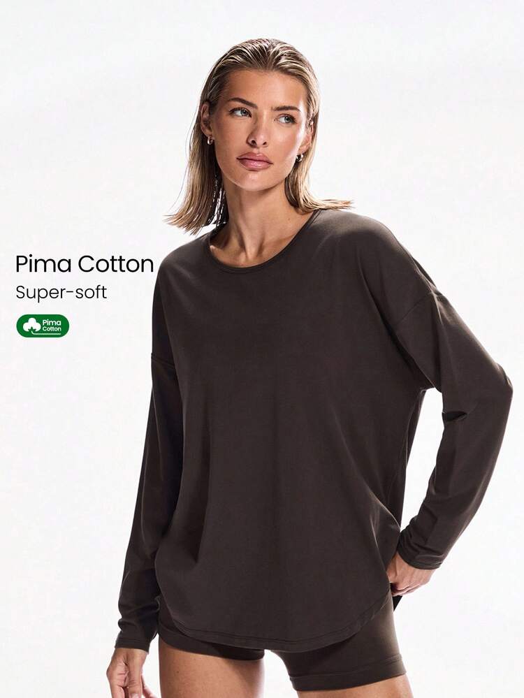 Camiseta casual diaria de cuello redondo, manga larga oversize y bajo con abertura curva, de algodón pima