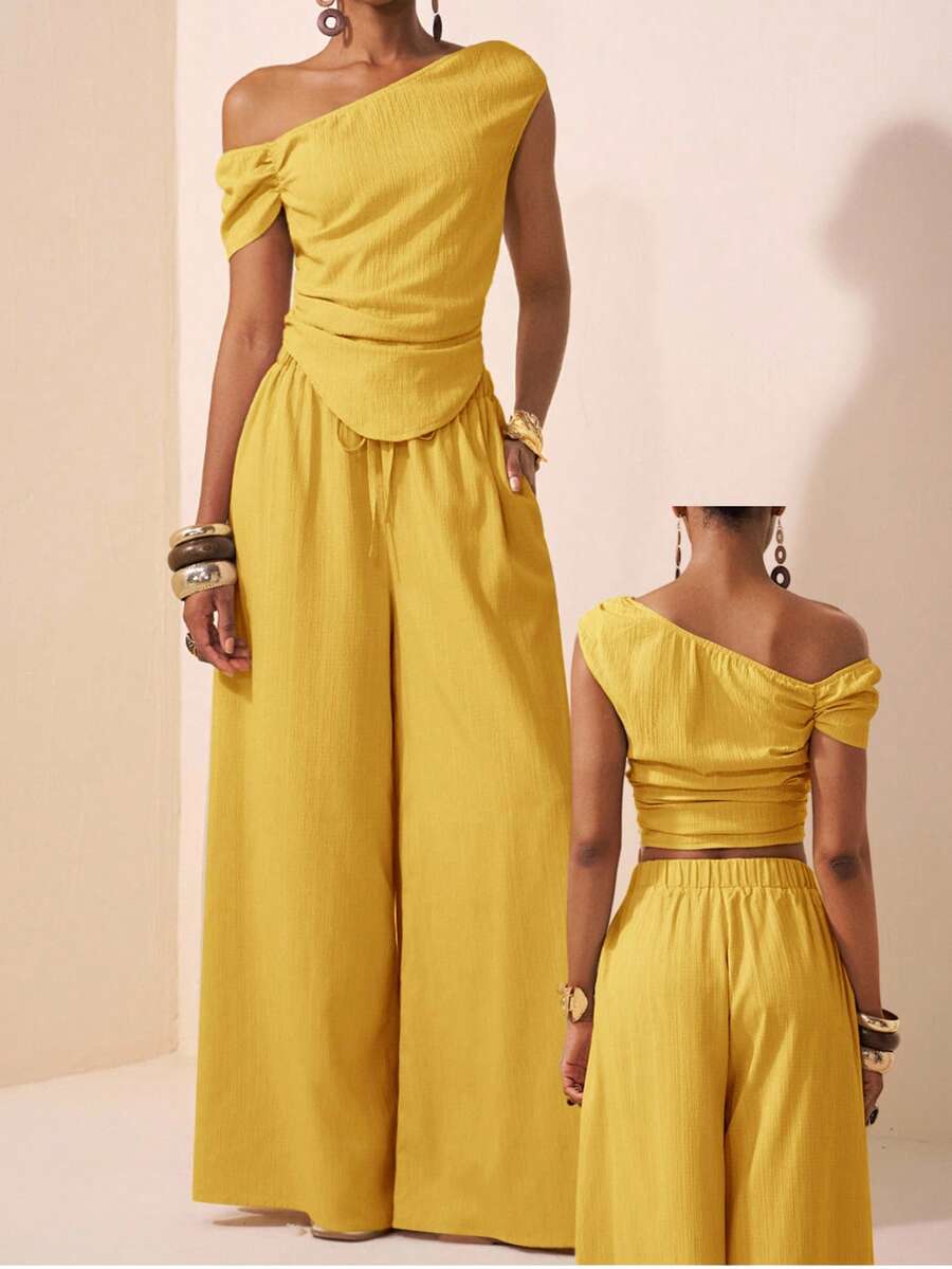 Zivah 2025春夏新款音乐节、复活节、圣帕特里克节、西部风、游牧风、生日派对、毕业典礼、学院风、学生装、日常休闲、百搭、休闲、邮轮旅行、海滩、日光浴、爆款、街头风、婚礼宾客波西米亚风、通勤、早午餐、机场穿搭杏色不对称肩部褶皱弧形下摆露脐上衣和阔腿裤两件套，带口袋，纹理面料 - 黃色 - 查看 1