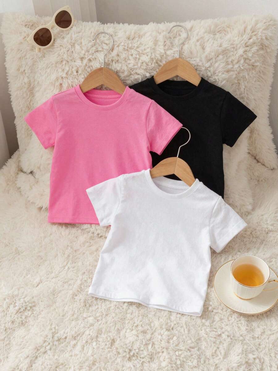 SHEIN 3 Stücke/Set Mädchen Rundhals Kurzarm T-Shirts, Weiß, Schwarz, Rosa, Lässig, Minimalistisch, geeignet für Outdoor Sport, Alltag, passend für Herbst, Sommer, für Mädchen, Zuhause, Alltag, Winter, Frühling, Sommer, Vielseitig einsetzbar - Verschiedenfarbig - Übersicht 1