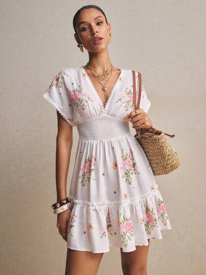 Poéselle Women's Boho Floral Smocked-Waist Mini Dress – White V-Neck Ruffle Hem Babydoll Sundress Floral Mini Dress White Summer Dress Smocked Waist Dress Boho Babydoll Dress Cottagecore Outfit Ruffle Hem Dress Flutter Sleeve Dress Garden Party Dress Deep Shirred Floral Print Shirred Dress, Fashionable For Party And Outing Summer Dress Festival Outfits For Women Beach Dress Wedding Guest Dress For Women Country Concert Outfit Ruffle Dress  Floral Dresses For Women White Dress