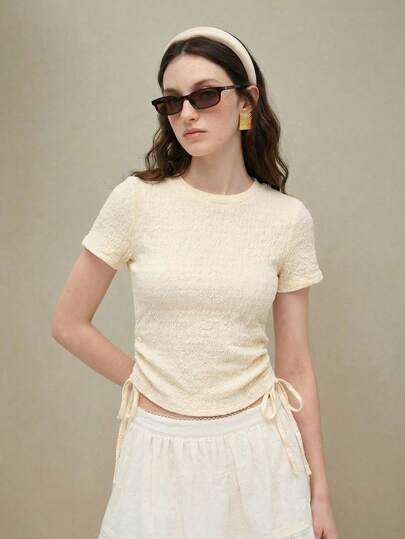 Muvela Nouveau pull beige col rond texturé avec plissé sur les côtés, nœud papillon à cordon, polyvalent pour le bureau et les occasions formelles