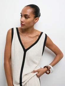 MAIJA Strandklänning med volang och elastisk midja - Svart och Vitt - Visa 7