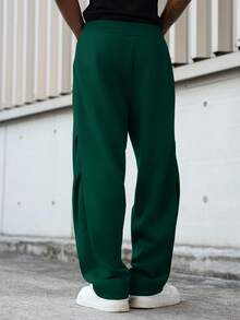 Manfinity Hypemode Pantalones de chándal casuales para hombres de unicolor con cordón en la cintura y bolsillos en diagonal - Verde - Ver 7