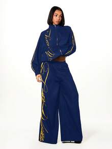 SUMWON WOMEN Women Oversized Wide Leg Track Pants With Contrast Yellow Graphic Print Side Panels Elastic Waist Relaxed Fit Streetwear - Navy Blue - View 3