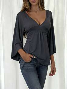INAWLY Áo kiểu nữ dáng suông, gợi cảm, tối giản, màu trơn, cổ chữ V sâu, tay loe, thích hợp cho mùa xuân/thu. - Màu xám đen - Xem 1