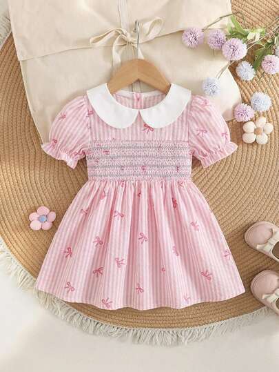 SHEIN Baby Girls' Spring Casual Vacation Cute Sweet Puff Sleeve A-Line Short Sleeve Dress, Textured Fabric With Exquisite Smocking Craft, High Quality And Cost-Effective, Suitable For Travel Or Vacation Outfits