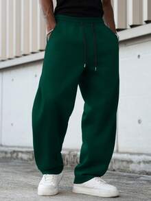 Manfinity Hypemode Pantalones de chándal casuales para hombres de unicolor con cordón en la cintura y bolsillos en diagonal - Verde - Ver 3