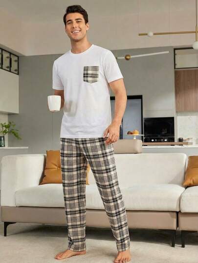 Set de Pijama de 2 piezas para hombre Estilo Minimalista con Pantalones de Cuadros y Bolsillo a Juego Diseñadas para ofrecer el máximo confort sin sacrificar el estilo, estas pijamas son perfectas para noches de cine en casa, mañanas de domingo relajadas o para ese regalo especial que disfrutarán. Eleva el nivel de tus momentos de descanso con nuestro exclusivo set de pijamas para hombre . Este Set combina la sofisticación de lo simple con un toque clásico que nunca pasa de moda.
