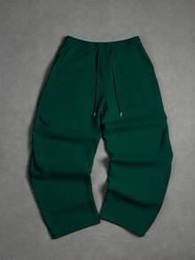 Manfinity Hypemode Pantalones de chándal casuales para hombres de unicolor con cordón en la cintura y bolsillos en diagonal - Verde - Ver 8