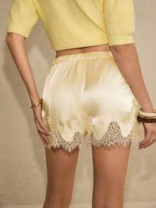 Poéselle Quần short nữ thanh lịch với chất liệu ren tương phản, cạp chun, túi bên hông, thích hợp cho mùa hè. - Vàng nhạt - Xem 7