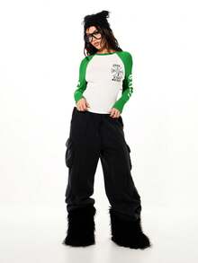 SUMWON WOMEN Raglan Sleeve Graphic Crew Neck Long Sleeve Top With Cross Print And Side Text Detail - Green - View 4
