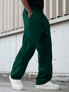 Manfinity Hypemode Pantalones de chándal casuales para hombres de unicolor con cordón en la cintura y bolsillos en diagonal - Verde - Ver 5