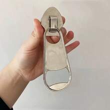 Joivida 1个创意拉链式开瓶器，适用于大号啤酒和饮料瓶，可吸附在冰箱上，时尚高品质杠杆式开瓶器，非常适合作为圣诞节、万圣节、复活节、情人节、生日礼物，独特而别致，是送礼的最佳理想之选。 - 銀色 - 查看 10