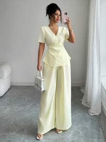 Elenzga 女士浅黄色波浪纹理V领系带短袖衬衫搭配直筒裤两件套，优雅精致，适合情人节、复活节、劳动节、生日、约会、派对、正式场合、教师装、旅行、街头风、春夏穿着。 - 淡黃色 - 查看 8