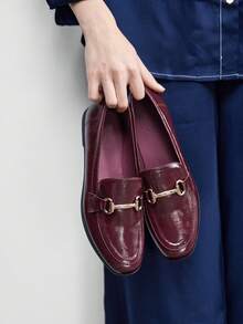 Burgundy skin with oily pattern