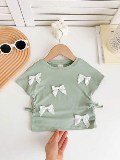 SHEIN LMoss Kids Áo thun ngắn tay màu trắng dễ thương, thoải mái, đa năng cho bé gái, có nơ, thích hợp cho mùa hè.