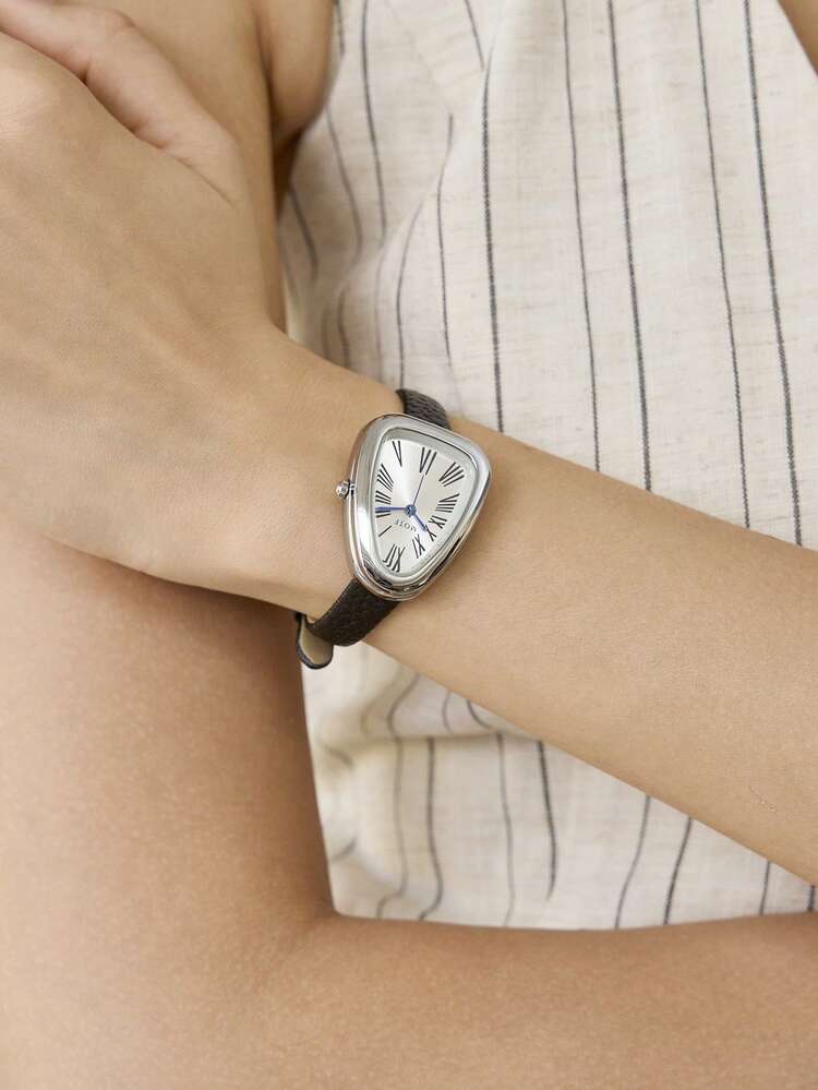 A SMALL WATCH WITH AN OVAL SHAPE, SILVER DIAL, AND ROMAN NUMERAL MARKINGS