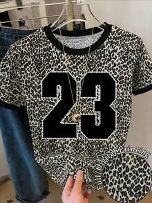 Resyla Women's Leopard Print Numeral Graphic Round Neck Short Sleeve T-Shirt - Multicolor - View 1