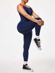 Seamluxe SHEIN Sport 女士无缝交叉露背运动连体裤，适合户外运动、健身、瑜伽、跑步等。这款连体裤采用交叉露背设计，一体式设计，兼具运动和健身功能。它是一款女士健身连体裤，露背设计，提臀塑形，适合全身运动。此外，它还是一款女士运动服，适合健身穿着。 - 彩色 - 查看 5