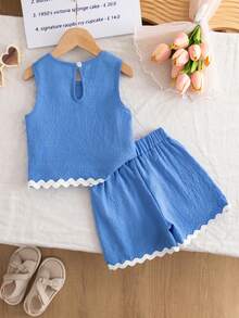 Elladie kids Bộ áo thun không tay và quần short kiểu dáng thường ngày dành cho bé gái (cỡ nhỏ), chất liệu vải có họa tiết, phối màu tương phản, gồm áo và quần short. - Màu xanh lam - Xem 2