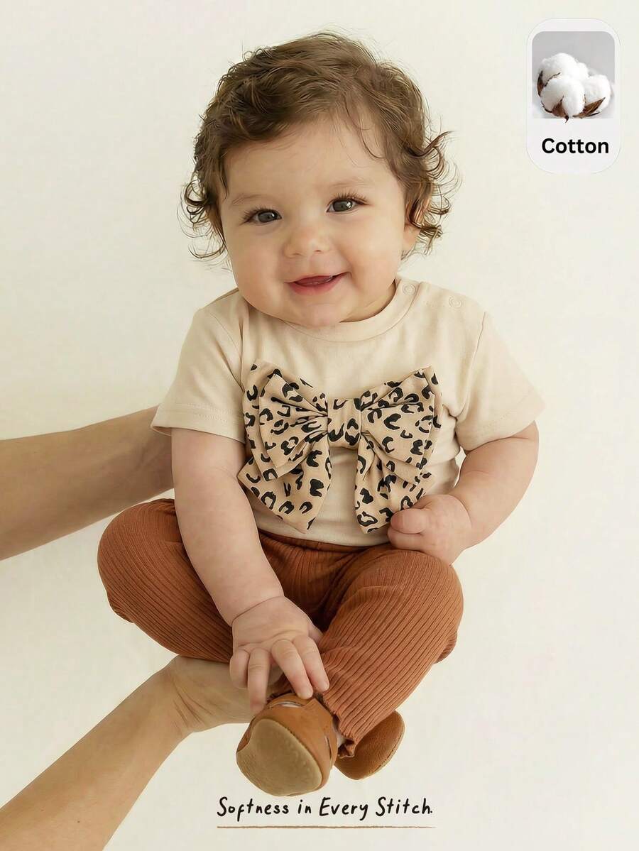 Cozy Pixies Ensemble 2 pièces pour nouveau-né fille : Top à manches courtes col rond en tricot avec nœud et pantalon à taille élastique - Multicolore - Voir 1