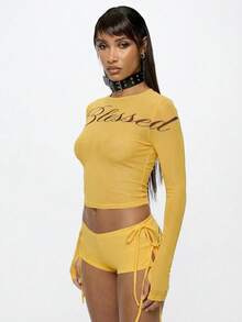 SUMWON WOMEN Long Sleeve Graphic Crop Top With Script Print Round Neck Fitted Ribbed Texture Casual Statement Piece - Orange - View 5