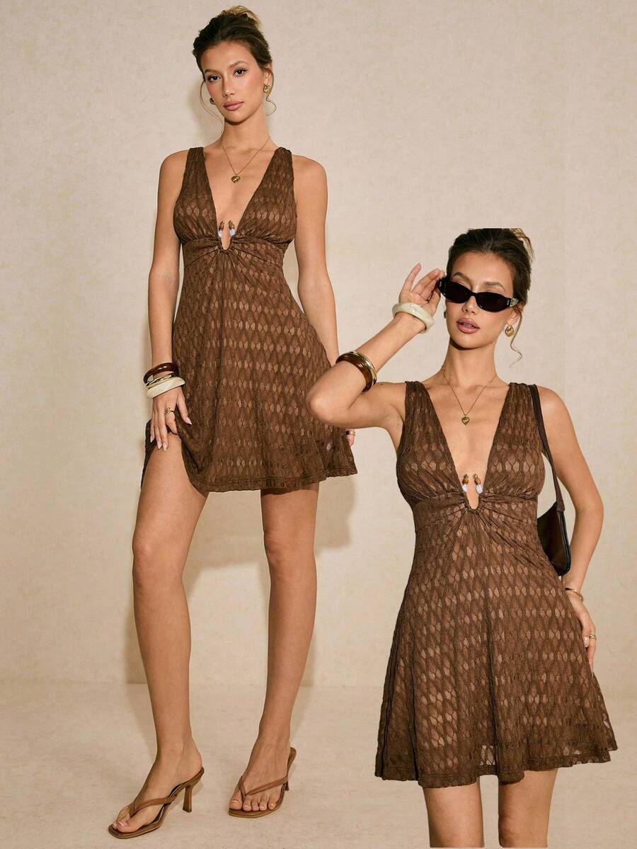 Poéselle Đầm ngắn không tay cổ chữ V sâu, chất liệu có họa tiết dành cho nữ