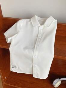SHEIN 1pc Young Boys' Minimalist Silhouette All-Match White Short Sleeve Shirt, Suitable For Daily Wear, Outings, Wedding Season, Holiday Parties, Summer Beach Vacations, Spring/Summer - White - View 6
