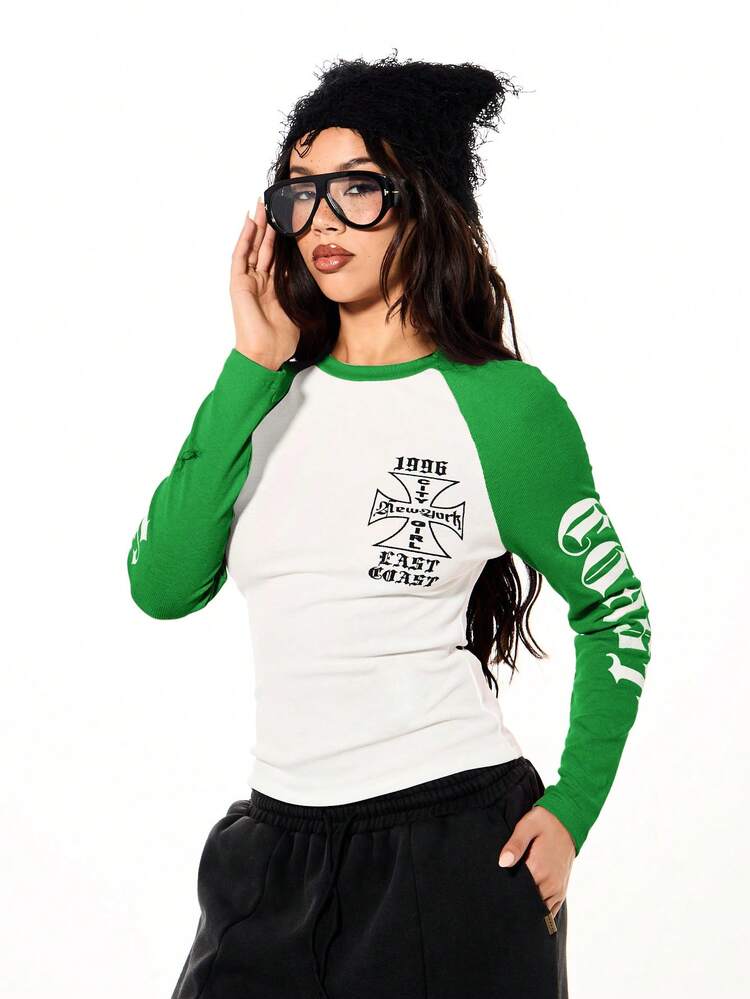SUMWON WOMEN Raglan Sleeve Graphic Crew Neck Long Sleeve Top With Cross Print And Side Text Detail