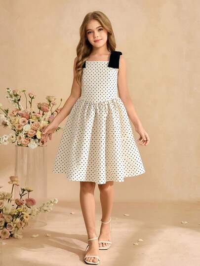 SHEIN 女童波点吊带连衣裙，黑色蝴蝶结装饰，优雅时尚，适合青春期少女，春夏款