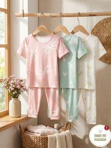 Genkimix Kids Bộ đồ ngủ ngắn tay ôm sát 6 món cho bé gái, họa tiết nơ và trái tim, co giãn, có thể giặt máy, thoải mái khi mặc, dễ bảo quản (3 bộ bán riêng lẻ) - Nhiều màu - Xem 7