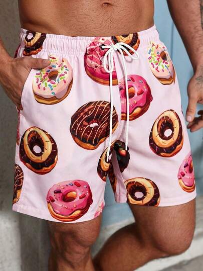 Manfinity Swimmode Quần short nam in hình bánh donut, túi xéo, eo có dây rút, kiểu dáng thường ngày, thích hợp đi nghỉ mát hoặc đi biển.