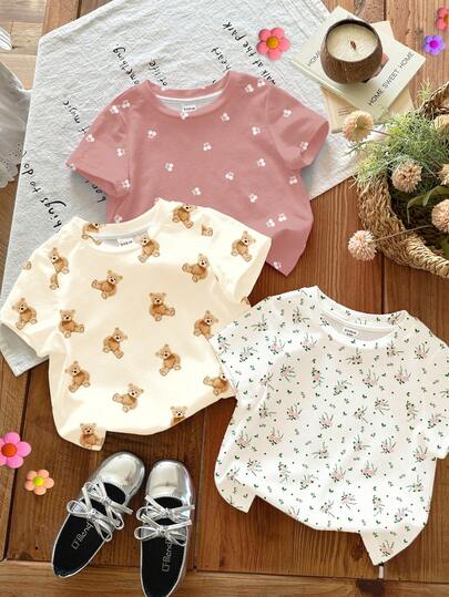 SHEIN 3件套粉色花卉、粉色樱桃、卡通熊印花圆领短袖基础款T恤，休闲百搭，适合年轻女孩，春夏日常穿着、居家、度假、乡村、农场、野餐、复活节等场合。