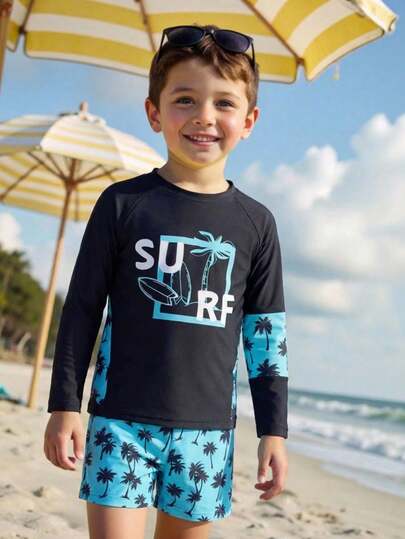 男童两件式泳衣套装，黑色椰叶印花长袖防晒衣和短裤，时尚休闲优雅，适合游泳、海滩、泳池、夏季度假等场合。