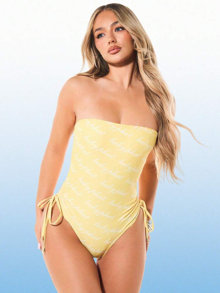 BABYPHAT Bandeau Strapless Ruched Side One Piece Swimsuit With Logo All Over Print Pattern And Adjustable Tie Details For Summer Beach Vacation