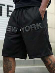AXEPEAK Men's Letter Embossed Drawstring Waist Casual Fashion Street Shorts - Black - View 1