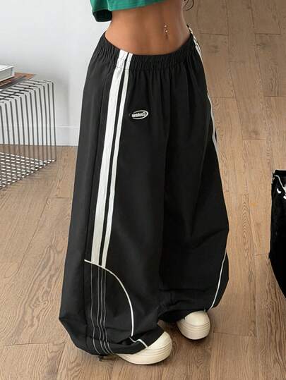 Coolane 女士夏季外出音乐节返校节比赛日刺绣图案宽松工装裤